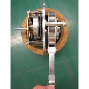 “Spring motor” flat spiral spring mechanism